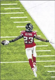  ?? JOHN SPINK / JSPINK@AJC.COM ?? The Falcons’ defense did put some points on the board in Sunday’s Super Bowl when cornerback Robert Alford returned an intercepti­on for a TD.