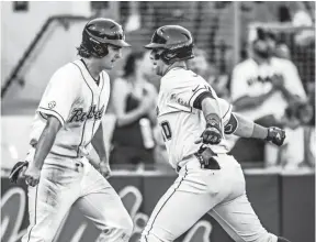  ??  ?? Tyler Keenan (right), Cole Zabowski (left) and the rest of their Ole Miss teammates are in good position for a national seed in the NCAA Tournament.