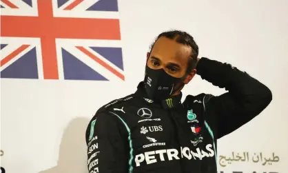  ??  ?? Lewis Hamilton, here at the Bahrain Grand Prix 12 days ago, will race in the Abu Dhabi grand prix after testing negative for coronaviru­s. Photograph: Bryn Lennon/Reuters