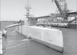  ?? Julie Watson Associated Press ?? MILITARIES have been working on unmanned vessels for decades. Above, the Sea Hunter, a self-navigating U.S. Navy ship, at a terminal in San Diego in 2016.