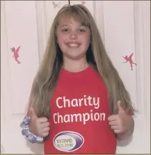  ?? ?? CHAMPION Grace McElhinney wearing a Wave 105 T-shirt