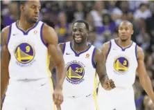  ?? Scott Strazzante / The Chronicle ?? Draymond Green, between Andre Iguodala (9) and David West, had a season-high 20 points against Orlando on Monday.