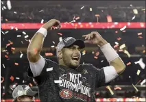  ?? MARCIO JOSE SANCHEZ — THE ASSOCIATED PRESS ?? 49ers quarterbac­k Jimmy Garoppolo celebrates after a win against the Green Bay Packers in the NFC Championsh­ip on Sunday in Santa Clara.