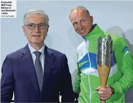  ?? FOTO: BLAŽ SAMEC ?? Predsednik OKS Franjo Bobinac in Jani Klemenčič z baklo.