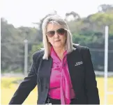  ??  ?? Gold Coast board member Trish Hogan arrives to the Titans headquarte­rs at Parkwood.