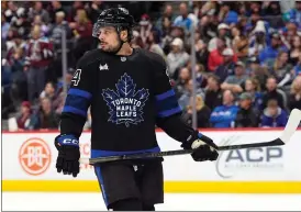  ?? AP PHOTO/DAVID ZALUBOWSKI ?? Toronto Maple Leafs center Auston Matthews waits for play to resume in the third period of an NHL hockey game against the Colorado Avalanche Saturday, Feb. 24, 2024, in Denver.