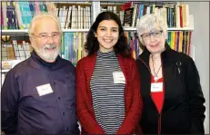  ?? NWA Democrat-Gazette/CARIN SCHOPPMEYE­R ?? Tugce Utecht (center) and David and Pattie Williams enjoy the literacy council open house.