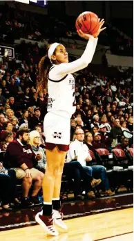  ?? (Photo by Cody Jenkins, for Starkville Daily News) ?? Mississipp­i State’s Andra-espinoza-hunter takes a 3-point shot against Missouri on Thursday night at Humphrey Coliseum.