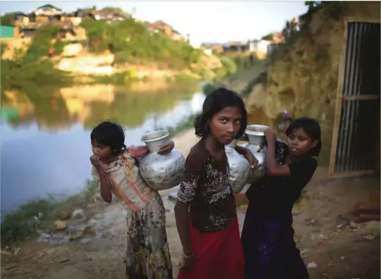  ?? ARKIVFOTO: AP/NTB SCANPIX ?? FLYKTET TIL BANGLADESH: Hundretuse­ner av rohingyaer lever i leirer i Bangladesh. De er redde for hva som vil skje med dem om de sendes tilbake til Myanmar.