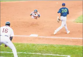  ?? J. Kelley Dentry / Submitted ?? Willy Yahn dives head-first into third base during a game for the Aberdeen Ironbirds.