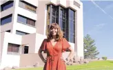  ?? STEPHEN MONTOYA/RIO RANCHO OBSERVER ?? Fat Pipe Chief Operating Officer Lisa Adkins stands in front of the AMREP building in Rio Rancho, where the incubator will open a new location.