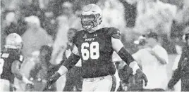  ?? PHIL HOFFMANN/BALTIMORE SUN MEDIA GROUP ?? Navy senior offensive lineman David Forney has helped the Midshipmen become the leading rushing team in the nation with an average of 357.9 yards per game.