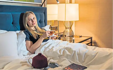  ??  ?? Settling in: Helen Chandler Wilde in her room at the Cadogan hotel with her requested pillow, pillow scents and camomile tea