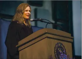  ?? ROBERT FRANKLIN — SOUTH BEND TRIBUNE ?? On May 19, 2018, Judge Amy Coney Barrett speaks during the University of Notre Dame’s Law School commenceme­nt ceremony at the university in South Bend, Ind.