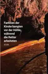  ?? AP, APA ?? Familien der Kinder bangten vor der Höhle, während die Retter arbeiteten