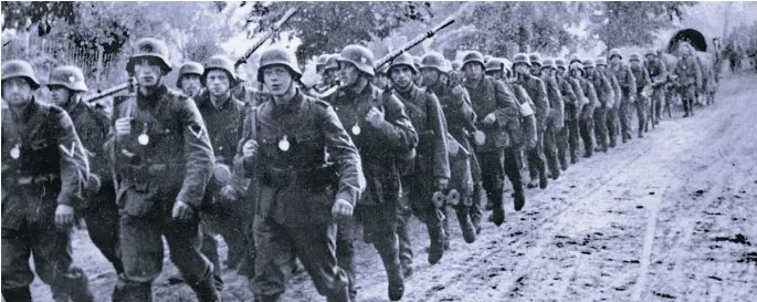  ?? STF / AFP / GETTY IMAGES ?? German troops in Poland in 1939. Adolf Hitler and his armies were high on chemical drugs similar to crystal meth for most of the war, a German author says.