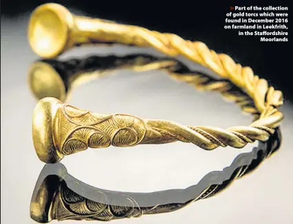  ??  ?? > Part of the collection of gold torcs which were found in December 2016 on farmland in Leekfrith, in the Staffordsh­ire Moorlands