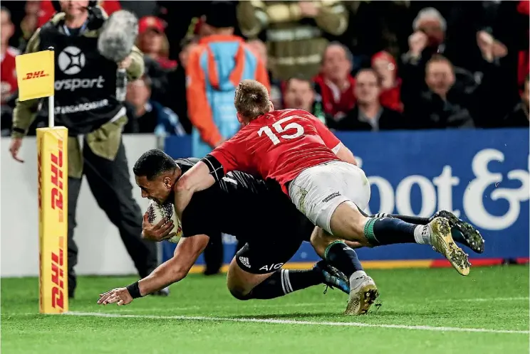  ??  ?? Second five-eighth Ngani Laumape dives over for the All Blacks’ first try in the 15-15 draw with the British and Irish Lions at Eden Park last night.