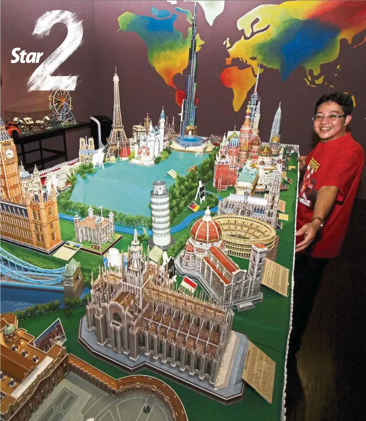  ?? — SAIFUL BAHRI/The Star ?? Chew with miniature iconic buildings from around the world.