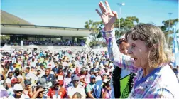  ??  ?? END RESULT: Mara Alkin, 74, was pictured finishing the race as the last participan­t with her grandson, Adam Sonday.