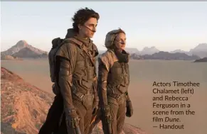  ??  ?? Actors Timothee Chalamet (left) and Rebecca Ferguson in a scene from the film Dune.
— Handout