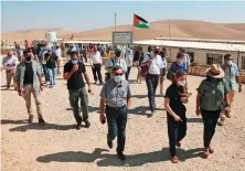  ?? AFP ?? A group of EU Heads of Mission along with Israeli NGOS visit Palestinia­n communitie­s in the Masafer Yatta area in the South Hebron Hills.