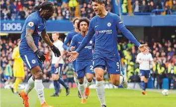  ?? AP ?? Chelsea’s Alvaro Morata (right) celebrates after scoring during the Premier League match against Tottenham. Last weekend’s defeat left the Blues eight points adrift of the positions that bring qualificat­ion for next season’s Champions League.