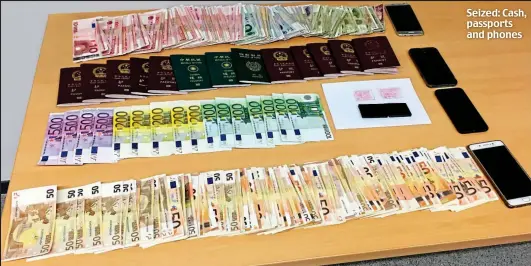  ??  ?? Seized: Cash, passports and phones