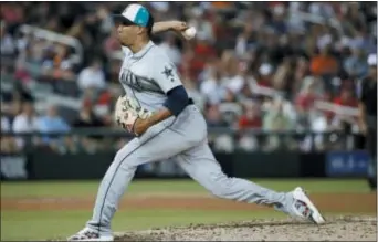  ?? ALEX BRANDON — THE ASSOCIATED PRESS ?? Seattle’s Edwin Diaz throws in the ninth inning during the All-Star Game on Tuesday.