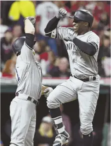  ?? AP PHOTO ?? TWO GOOD: Didi Gregorius (right) celebrates his tworun homer with Brett Gardner.