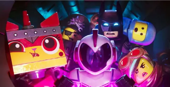  ?? Warner Bros. Pictures photos ?? Above: From left: Ultrakatty (Alison Brie), MetalBeard (Nick Offerman), General Mayhem (Stephanie Beatriz), Batman (Will Arnett), Benny (Charlie Day) and Lucy/Wyldstyle (Elizabeth Banks) in the animated adventure “The Lego Movie 2: The Second Part.”
