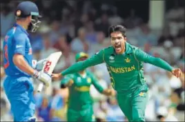  ??  ?? Defining moment: Mohammad Amir dismisses India’s captain and batting mainstay Virat Kohli.