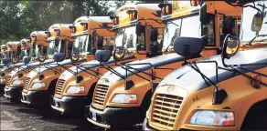  ?? Ned Gerard / Hearst Connecticu­t Media file photo ?? City of Shelton school buses parked in Shelton in 2018.