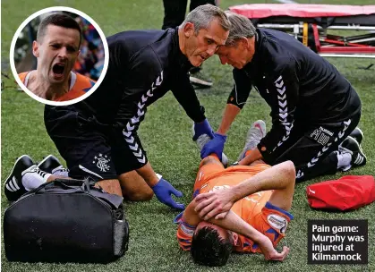  ??  ?? Pain game: Murphy was injured at Kilmarnock