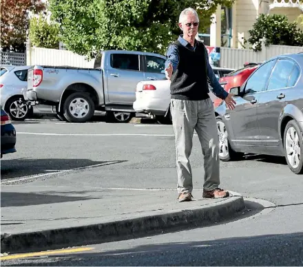  ?? PHOTO: MARION VAN DIJK/FAIRFAX NZ ?? Mike Murphy says wants yellow lines painted on a corner on Shelbourne St.