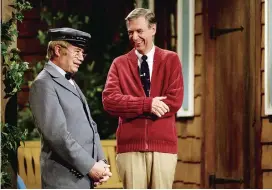  ??  ?? David Newell as Mr McFeely (left) and Fred Rogers on the set of “Mister Rogers’ Neighborho­od” from “Won’t You Be My Neighbor”