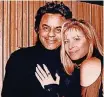  ??  ?? Johnny Mathis with Barbra Streisand are shown in the recording studio in the 1990s.