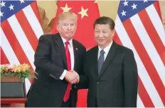  ??  ?? El presidente de Estados Unidos, Donald Trump y su homólogo de China, Xi Jinping, el pasado 9 de noviembre en Beijing.