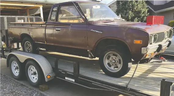  ?? PHOTOS: PATRICK MCCREADY ?? Patrick Mccready’s 1976 Datsun King Cab project arrives at his Edmonton garage. Mccready rebounded from hip replacemen­t during the lockdown to get to work.
