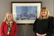  ?? SUBMITTED PHOTO ?? Dawn Coughlan and Judge Allison Royer of Chester County DAR stand near the Constituti­on signing print.