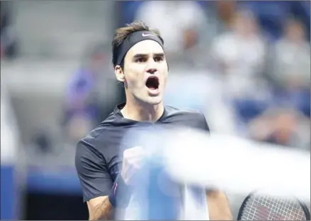  ?? JEWEL SAMAD/AFP ?? Roger Federer celebrates winning a point against Frances Tiafoe in their 2017 US Open men’s singles match at the USTA Billie Jean King National Tennis Center in Flushing Meadow, New York, on Tuesday.