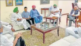  ?? PTI ?? Punjab Congress Committee president Navjot Singh Sidhu along with others during a meeting with chief minister Capt Amarinder Singh in Chandigarh on Tuesday.