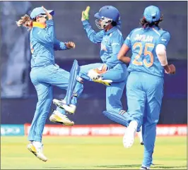  ??  ?? India's Veda Krishnamur­thy, left, celebrates with Sushma Verma during the opening match against England during the ICC Women's World Cup fixture at Derby.