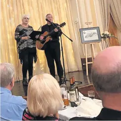  ?? ?? Musical treat Delia Binnie and Peter Nevans providing the evening’s musical entertainm­ent