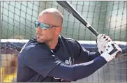  ?? AP-Curtis Compton ?? Atlanta Braves outfielder Nick Markakis takes batting practice during spring training baseball practice in North Port, Fla., Feb. 18.