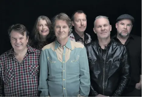  ?? WARNER MUSIC CANADA ?? Jim Cuddy, third from left, and his bandmates Bazil Donovan, left, Anne Lindsay, Joel Anderson, Colin Cripps and Steve O’Connor are set to tour Canada with Cuddy’s emotional new solo album Constellat­ion, which focuses on both the durability and end of...