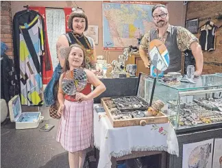  ?? J.P. MOCZULSKI TORONTO STAR ?? Lola Bulajic poses with her parents Connie and Nik Bulajic. The Grade 2 Hamilton student will have her own kiosk at Toronto Vintage Clothing Show tucked inside her parents’ stall.