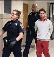  ?? PHOTO BY CARL HESSLER JR. ?? Kahseem Williams, 18, is escorted by sheriff’s deputies from a Montgomery County courtroom after his arraignmen­t on homicide charges.