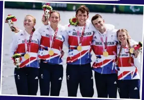  ??  ?? Oarsome: Thrilled heroes with mixed coxed four medals