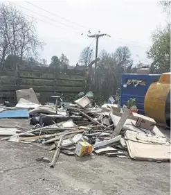  ??  ?? Disgracefu­l sight: Some of the rubbish that’s been dumped near Clunie by fly-tippers during the lockdown.